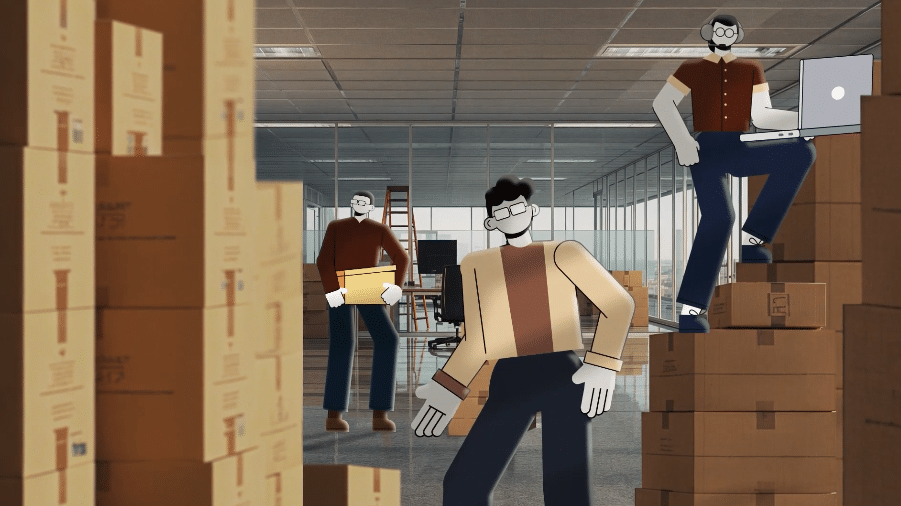 Employees surrounded by moving boxes during an office relocation, unsure how to manage the technology transition